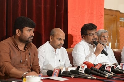 Bengaluru: Karntaka Ministers M.B. Patil, Dr Sharan Prakash Patil, Vinay Kulkarni address a press conference after state cabinet agreed to consider the Hindu sect of Lingayats as a separate religion, in Bengaluru on March 19, 2018. (Photo: IANS)