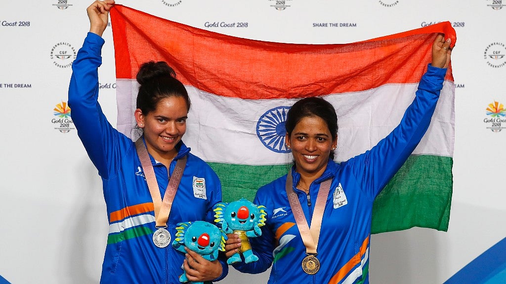 Tejaswini Sawant (right) and Anjum Moudgil with their medals in Gold Coast on Thursday. 