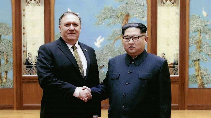 This image released by the White House shows the newly-appointed Secretary of State Mike Pompeo shake hands with North Korean leader Kim Jong-un.