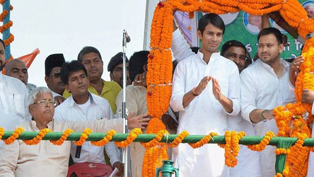 RJD chief Lalu Prasad Yadav (left) and his sons Tej Pratap Yadav and Tejaswi Yadav.&nbsp;