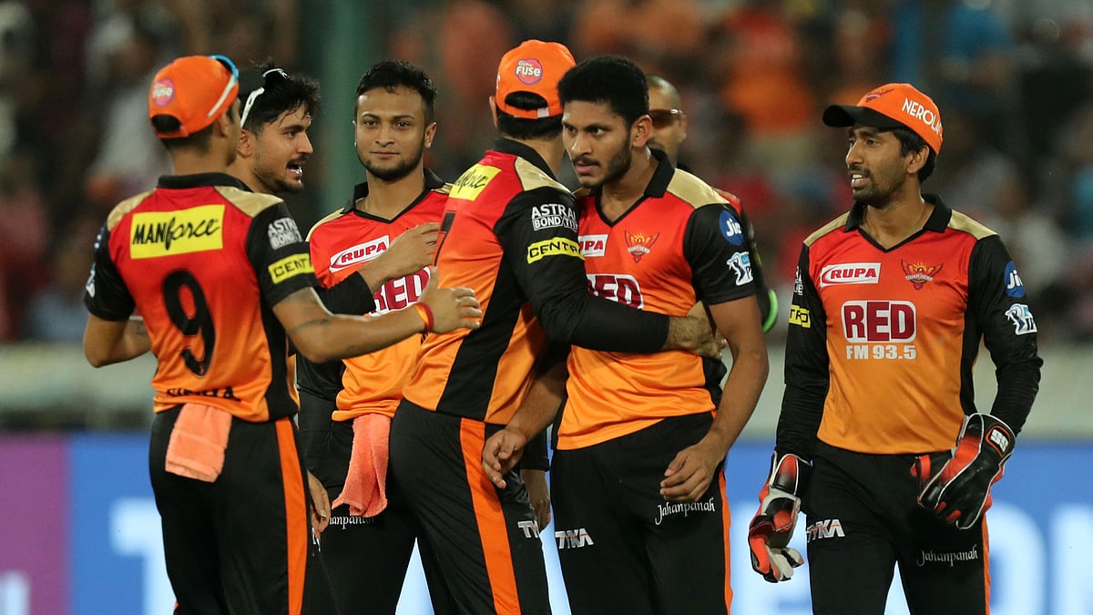 Basil Thampi celebrates the wicket of Chris Gayle.