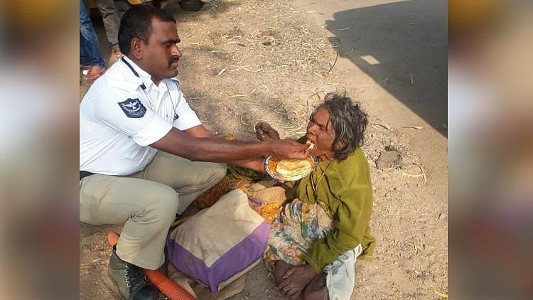 When Home Guard B Gopal saw Buchamma lying on the side of the road, he bought her food and fed her himself.