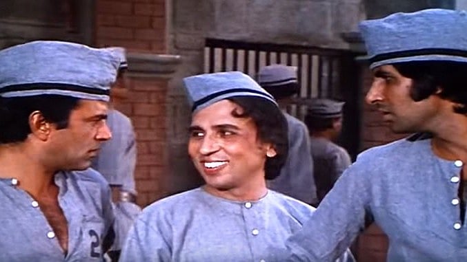 Raj Kishore with Dharmendra and Amitabh Bachchan from a still in <i>Sholay</i>.
