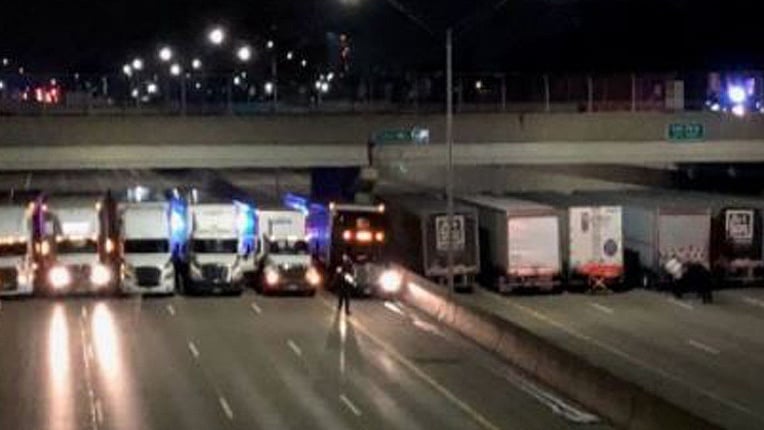 Drivers lined under a bridge help State Police prevent a suicide attempt. 