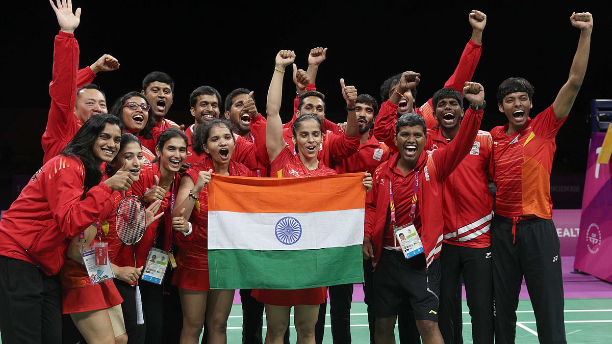 Saina Nehwal, Kidambi Srikanth, Ashwini Ponnappa celebrate India’s victory in the mixed team badminton final at the 2018 Commonwealth Games.