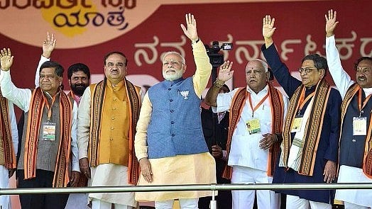 PM Modi and BJP Karnataka chief BS Yeddyurappa during a BJP rally in February, 2018.