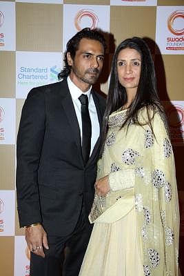 Actor Arjun Rampal and Mehr Jesia. (Photo: IANS)