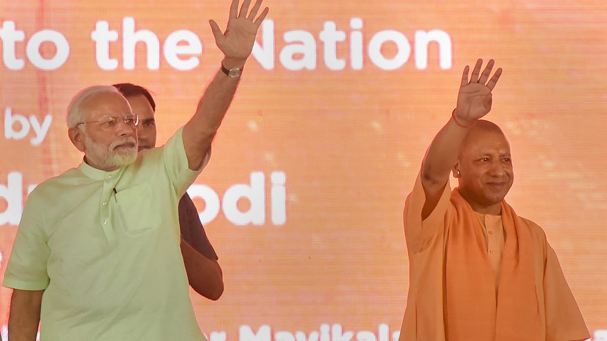 Baghpat: Prime Minister Narendra Modi with Uttar Pradesh Chief Minister Yogi Adityanath during the inauguration of 135km long-Eastern Peripheral Expressway (NH-II) connecting Kundli to Palwal, at Bagpat, in Uttar Pradesh