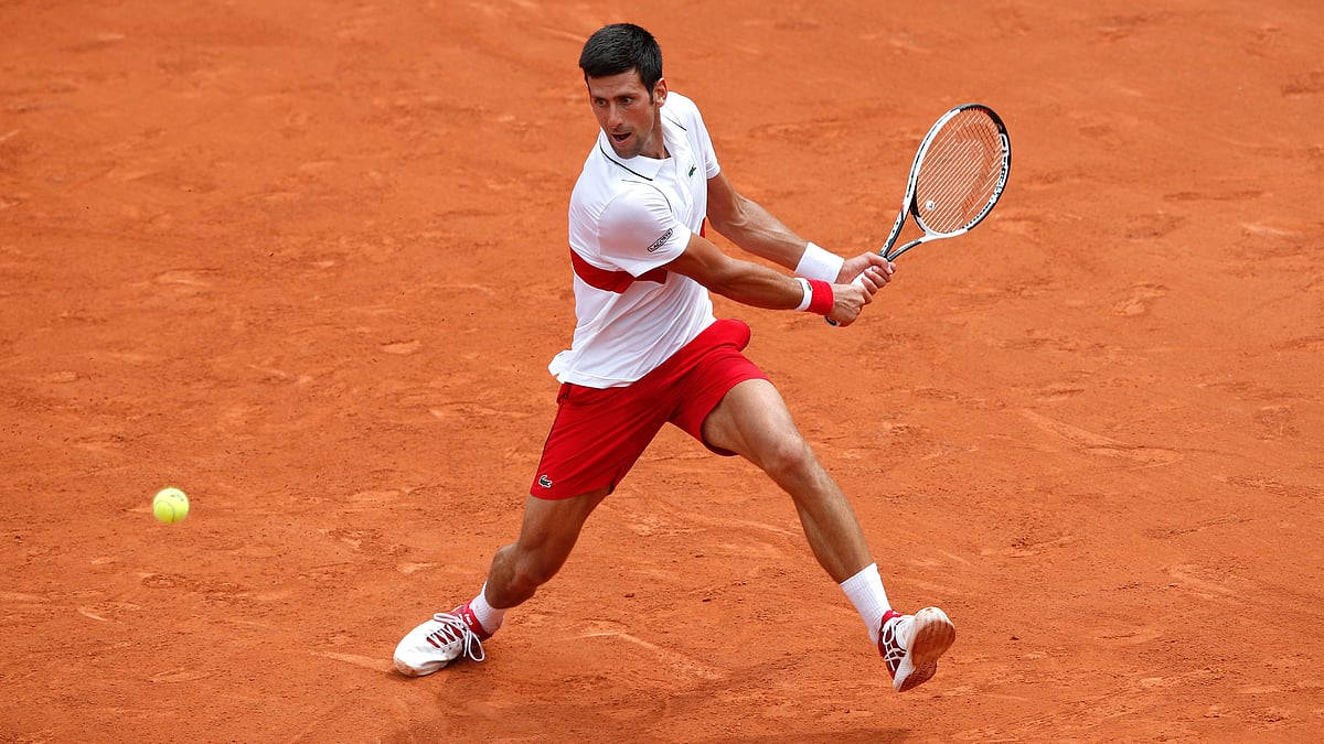 Novak Djokovic launched his campaign for a second French Open title with a moody victory.