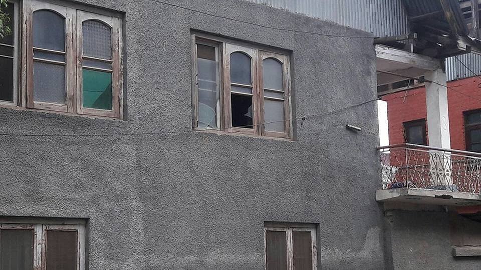 Senior J&K police official posted pictures of broken windows, damaged cars and his home allegedly ransacked by “security forces.”
