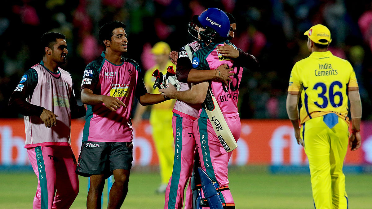 Jos Buttler celebrates with his teammates after helping Rajasthan Royals beat Chennai Super Kings.