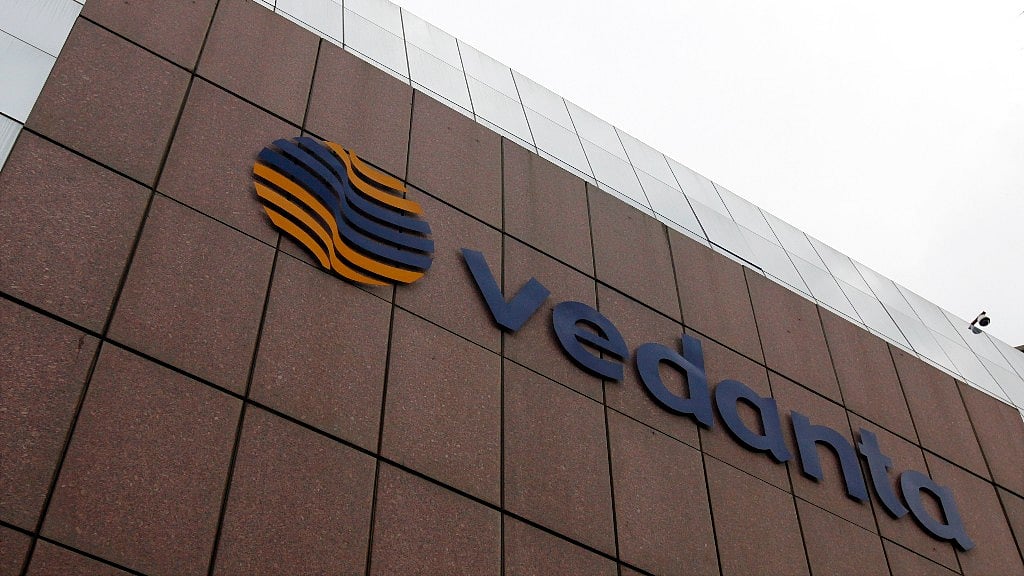 A bird flies by the Vedanta office building in Mumbai August 16, 2010.
