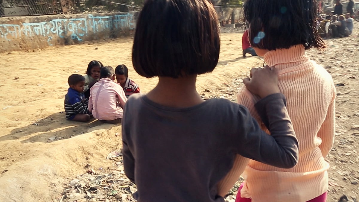 A photo of 6-year-old rape survivor Chhoti Nirbhaya (R) with her older sister.