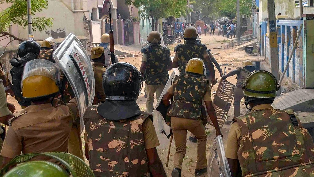 Police personnel tackles agitators in Tamil Nadu’s Tuticorin. 