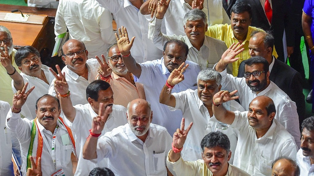 Congress, JD(S) leaders flash victory signs after Karnataka victory.