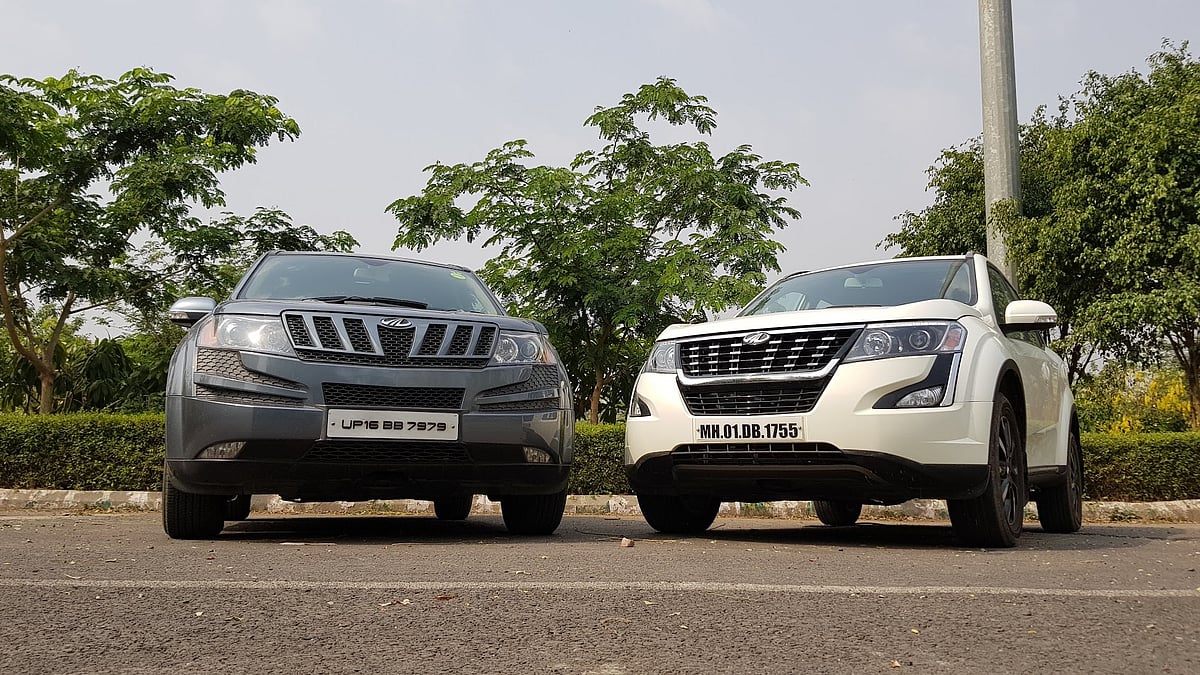 A 2011 Mahindra XUV500 W8 besides the new 2018 Mahindra XUV500 W11 AT AWD