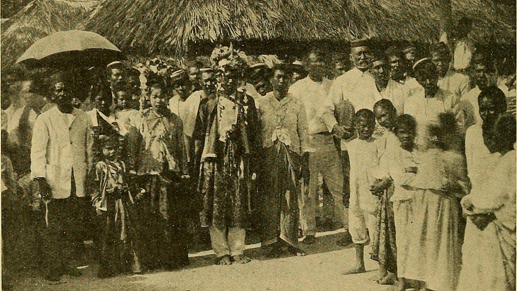 Cocos Malay photo from the 1910s showing a wedding procession that is still practised today with the groom pictured going to the bride’s house accompanied by members of the community.