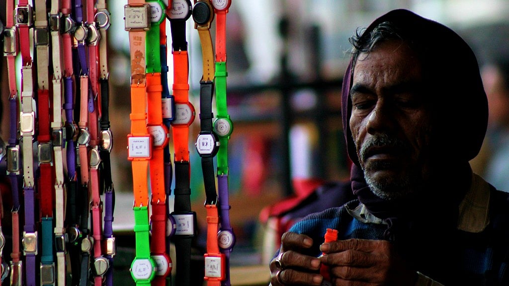 A watch seller sets up shop.