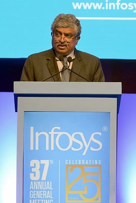 Bengaluru: Infosys Non-Executive Chairman Nandan Nilekani addresses at the 37th Annual General Meeting of Infosys at Christ University Auditorium, in Bengaluru on June 23, 2018. (Photo: IANS)