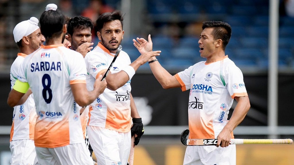 Indian team celebrate their first goal against Argentina on Sunday.