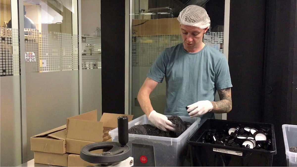 Iceland defender Birkir Mar Saevarsson packs Lava salt into jars in the Reykjavik factory where he works when he is not training