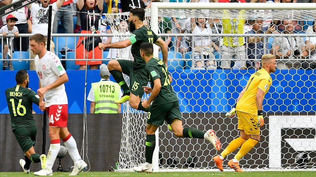 Australia’s Mile Jedinak (centre) celebrates after scoring the opening goal against Denmark at the Samara Arena on Thursday.&nbsp;