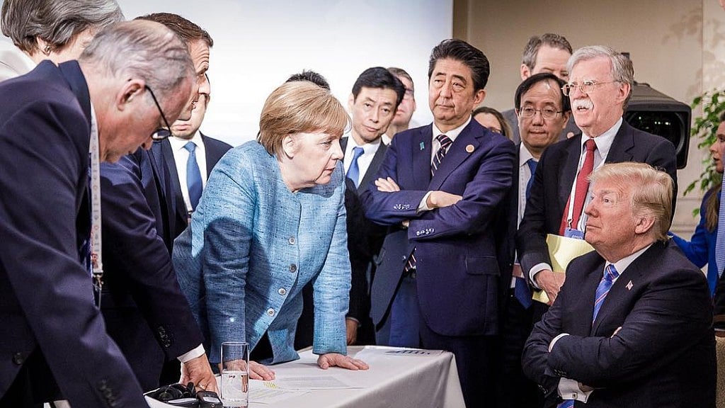 Photographer Jesco Denzel’s snap at the G7 summit has captured the attention of the world. 