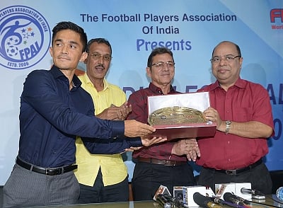 Kolkata: Indian football captain Sunil Chhetri being conferred "Indian Footballer Award 2018" by AIFF Senior Vice-President Subrata Dutta, former footballer Subrata Bhattacharya and Football manager Sanjoy Sen in Kolkata, on June 11, 2018. (Photo: IANS)