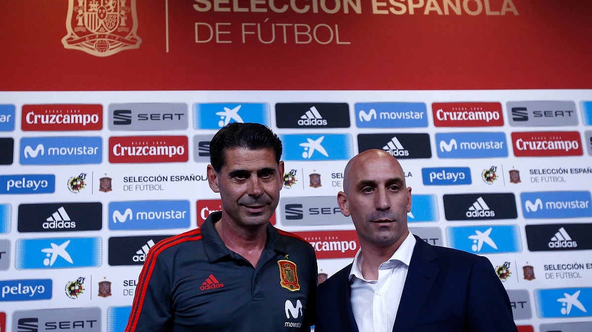 Spanish football president Luis Rubiales, right, poses with Spain’s new coach Fernando Hierro before a press conference at the 2018 soccer World Cup in Krasnodar, Russia, Wednesday, June 13, 2018.