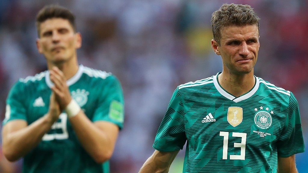 Germany’s Thomas Mueller (right) and Mario Gomez react after they were eliminated in the group stage of the World Cup for the first time in 80 years. 