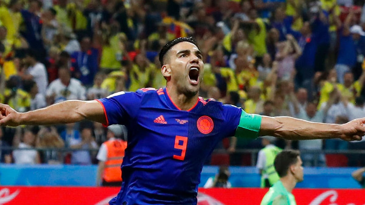 Rademal Falcao scores his side’s second goal against Poland.