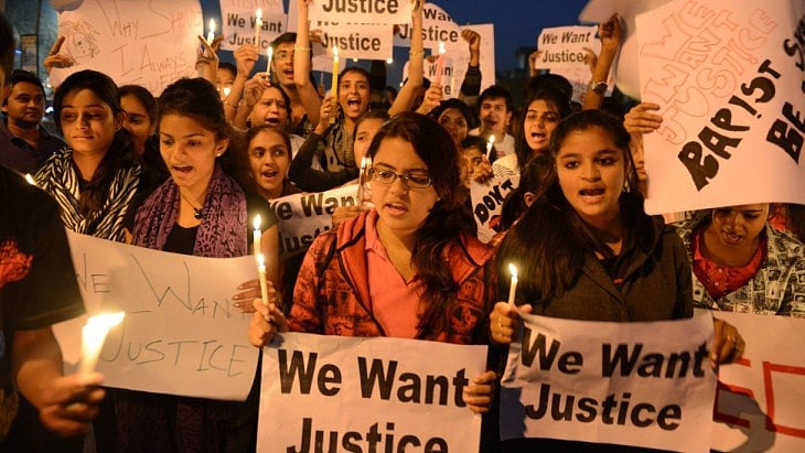 Woman protest against sexual harassment in India.
