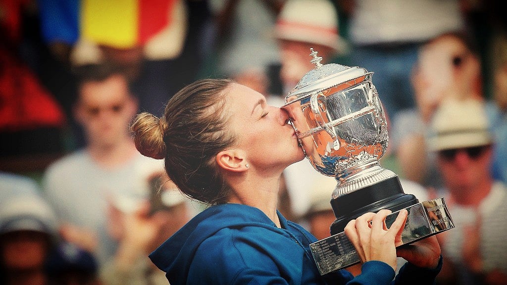 Romania’s Simona Halep kisses the cup after defeating Sloane Stephens of USA during their final match of French Open tennis at the Roland Garros stadium on Saturday.