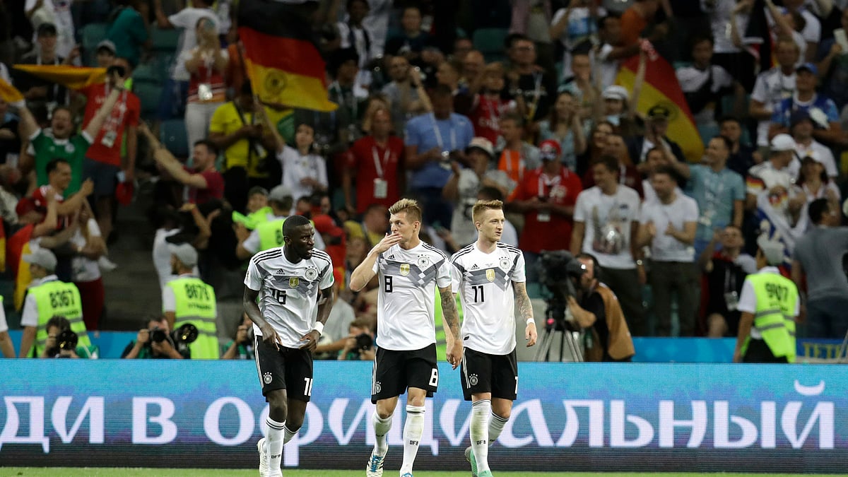 Germany’s Toni Kroos with his teammates Antonio Ruediger and Marco Reus after scoring a second goal during the Group F match between Germany and Sweden at the 2018 FIFA World Cup.