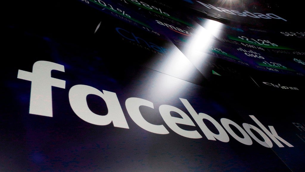 File photo of Facebook logo on screens at the Nasdaq MarketSite in New York’s Times Square.