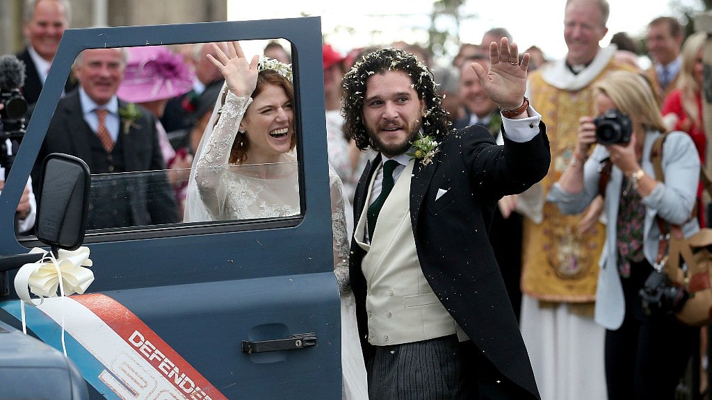 The bride looked stunning in a ivory lace wedding gown, while the groom wore a three-piece suit.