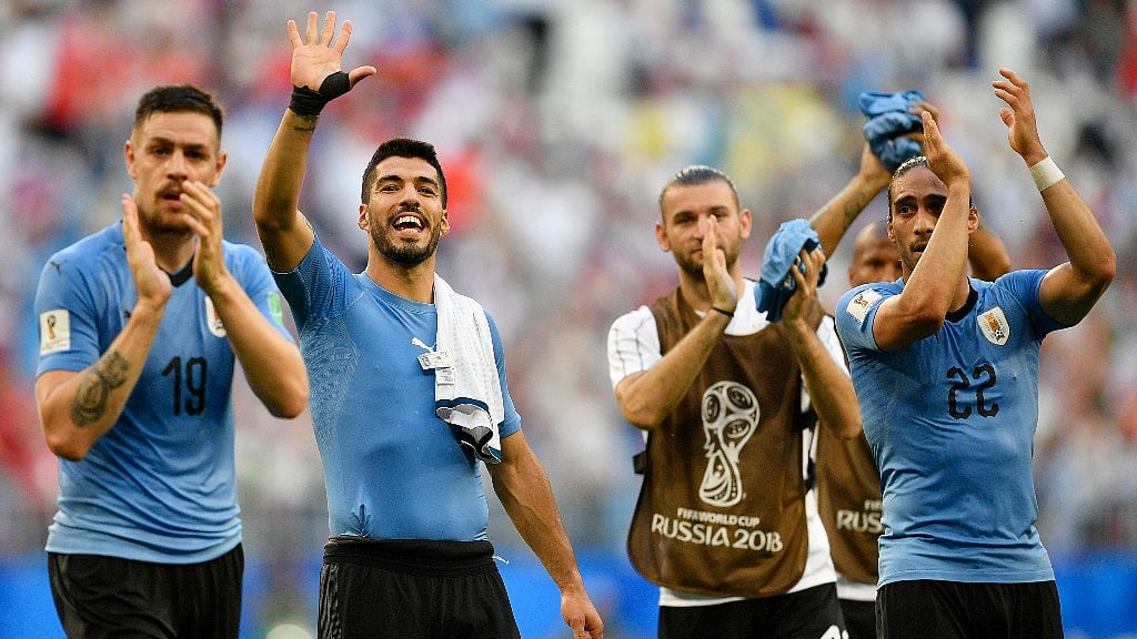 Uruguay’s Luis Suarez (second from left) celebrates with his teammates following their 3-0 win over Russia in their group A match at the Samara Arena on Monday.