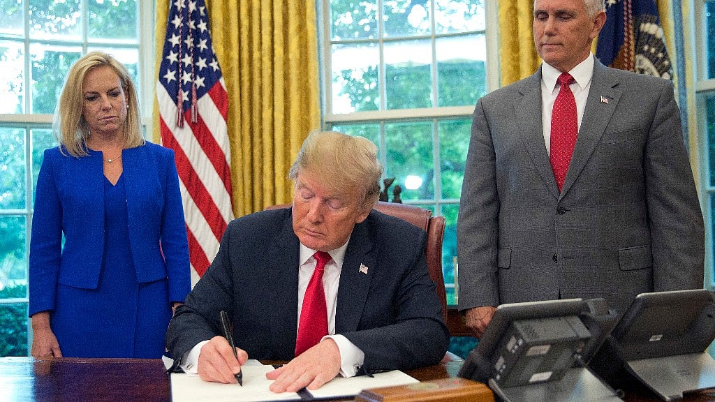 <div class="paragraphs"><p>Then President Donald Trump signs an executive order to keep families together at the border, but says that the ‘zero-tolerance’ prosecution policy will continue, during an event in the Oval Office of the White House in Washington.</p></div>