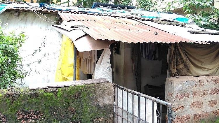 House of Anand Kolkar, a paralyzed man who passed away after five days of sitting next to his wife’s body. 