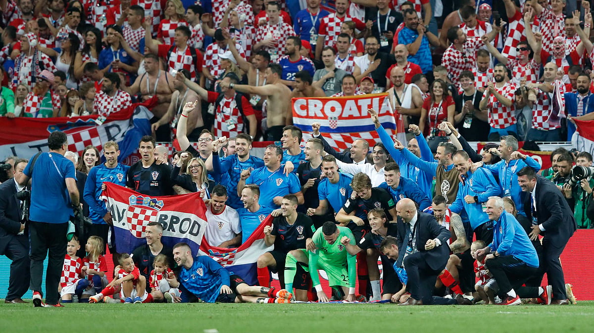 Croatia team celebrates at the end of the semifinal match between Croatia and England at the 2018 FIFA World Cup in the Luzhniki Stadium in Moscow, Russia, Wednesday, July 11, 2018. 