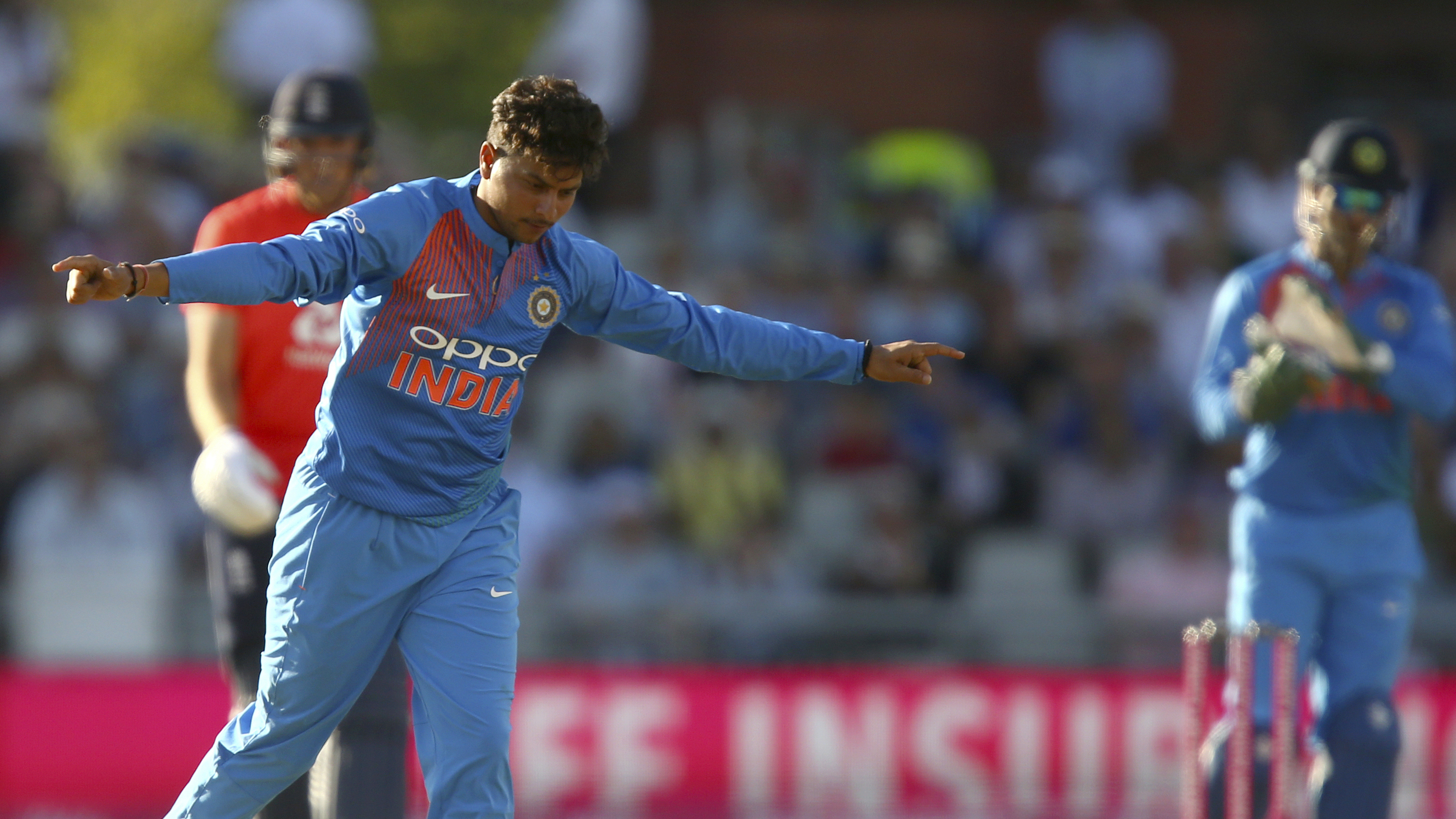 Kuldeep Yadav celebrates taking a fifer against England in the first T20 at Old Trafford.