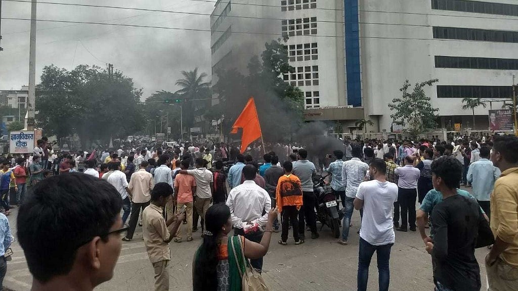 Maratha groups protesting for reservation, burnt tyres in Kopar Khairane, Navi Mumbai.