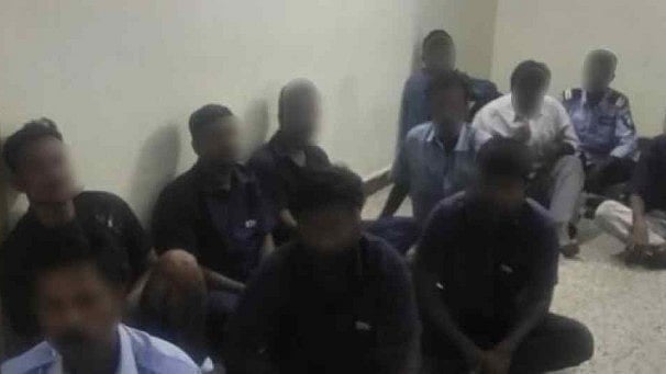 Photo of the accused after thrashed by lawyers on 17 July