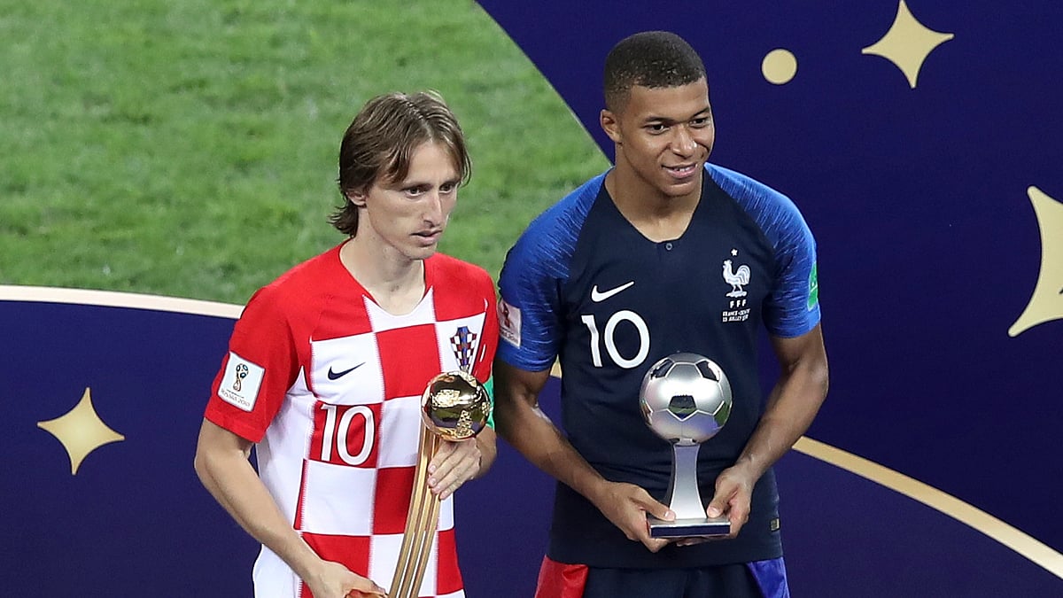 Croatia’s Luka Modric and France’s Kylian Mbappe, right, pose with their individual awards at the end of the final match between France and Croatia at the 2018 soccer World Cup in the Luzhniki Stadium in Moscow, Russia, Sunday, July 15, 2018. 