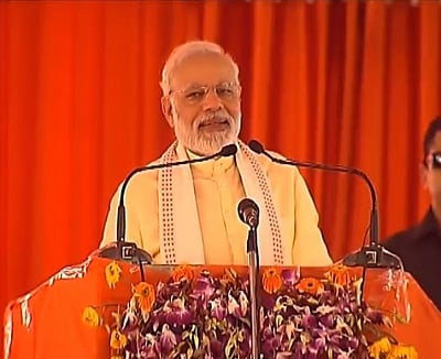 Azamgarh: Prime Minister Narendra Modi addresses at the inauguration of Poorvanchal Expressway in Azamgarh, Uttar Pradesh on July 14, 2018. (Photo:IANS/BJP)