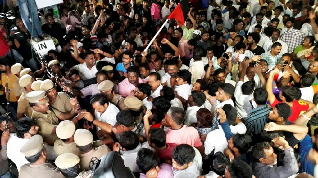 DMK supporters wait outside the Kauvery Hospital, where party chief M Karunanidhi is admitted.&nbsp;