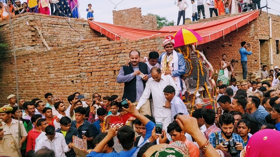 Dalit groom Sanjay’s wedding procession taken out amid heavy security in Uttar Pradesh’s Nizampura.