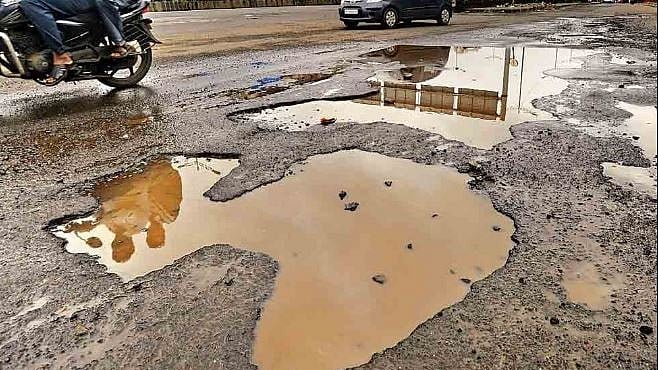 Representative photo of a pothole.