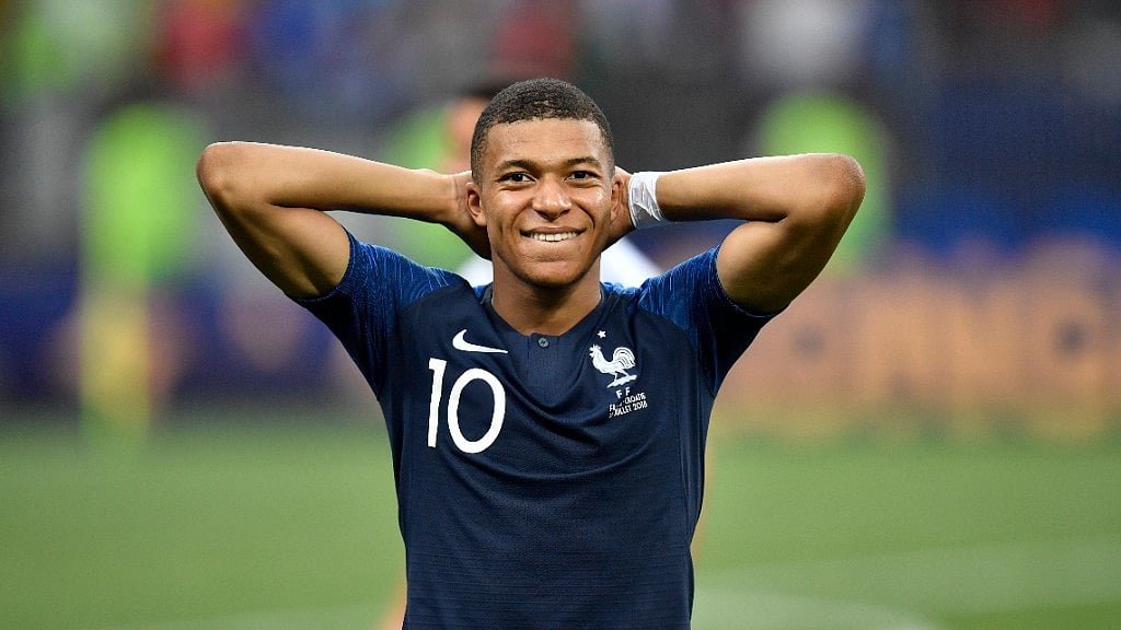 France’s Kylian Mbappe smiles after his team won 4-2 during the final match between France and Croatia at the 2018 soccer World Cup in the Luzhniki Stadium in Moscow, Russia, Sunday, 15 July 2018.&nbsp;