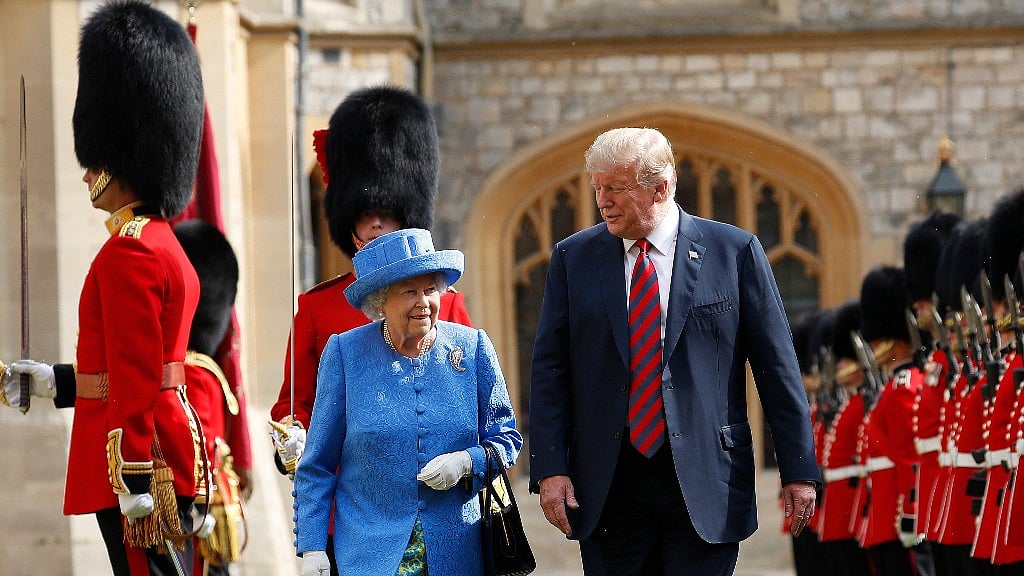 President Donald Trump with Queen Elizabeth II, inspecting the Guard of Honour at Windsor Castle in Windsor, England on 13 July.